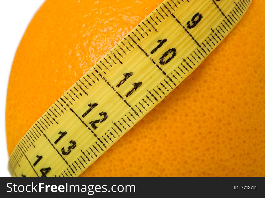 Orange with measuring tape isolated on white