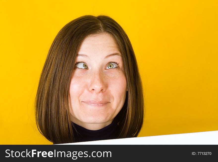 Crazy woman. On yellow background