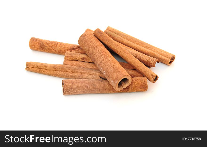 A shot of some cinnamon sticks on a white background