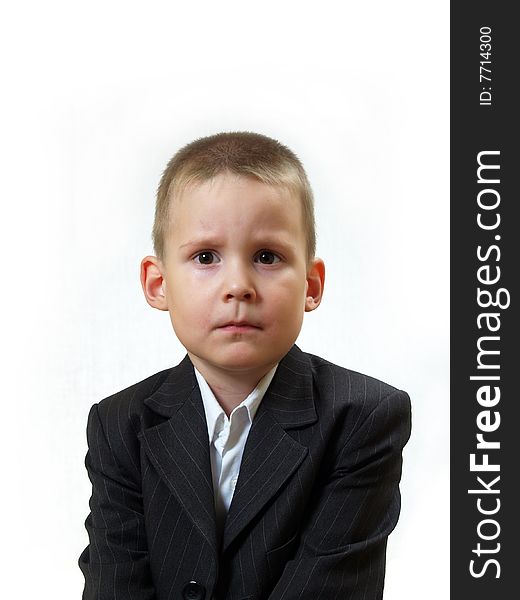 Boy in business cloth on white background