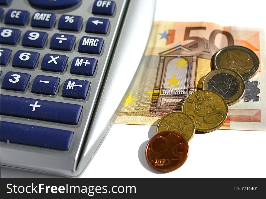 An image of euros and a calculator. An image of euros and a calculator