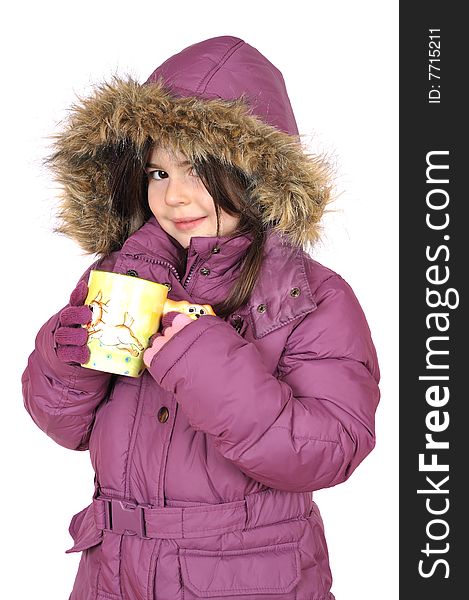 Little girl with cup of hot tea
