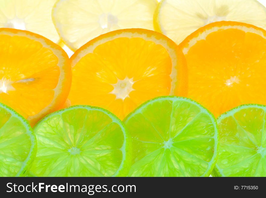 Background from citrus fruits, lime, orange and lemon. Background from citrus fruits, lime, orange and lemon