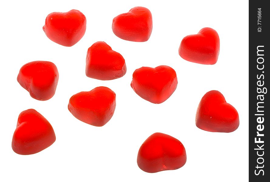 Ten heart shaped fruit jellies, located on circle, isolated on white