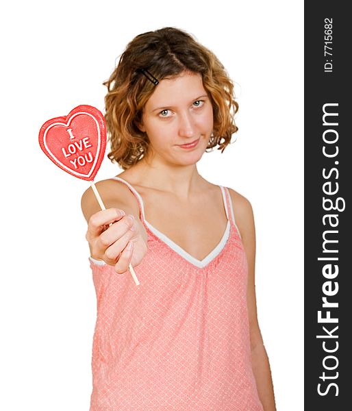 Girl with red heart shaped candy