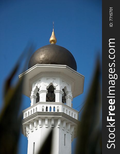 Mosque building top with blue sky as background