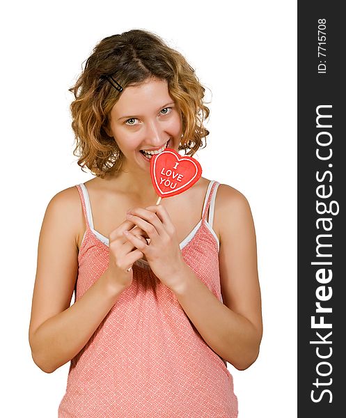 Girl with red heart shaped candy