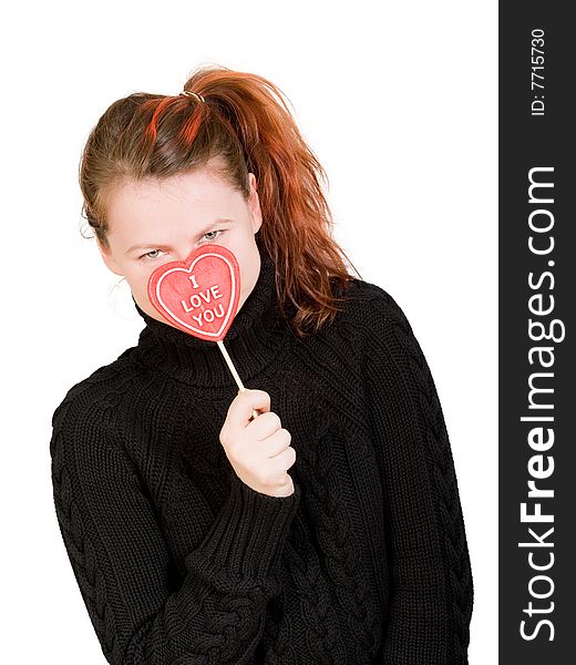 Young beautiful girl with red lollypop in hand. Young beautiful girl with red lollypop in hand