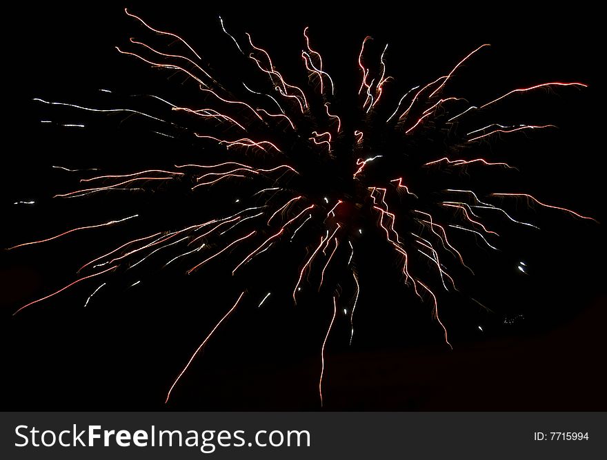 Photo of colourful fireworks in the night sky. Photo of colourful fireworks in the night sky.