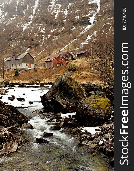 Norway tipical rural hut and river lanscape