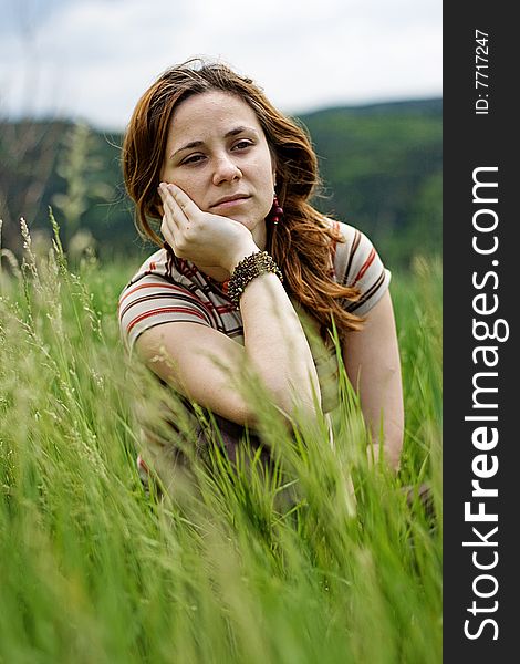 Beautiful Girl Lying Down Of Grass