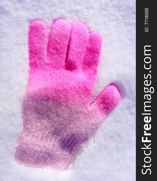 Glove in the snow - close up