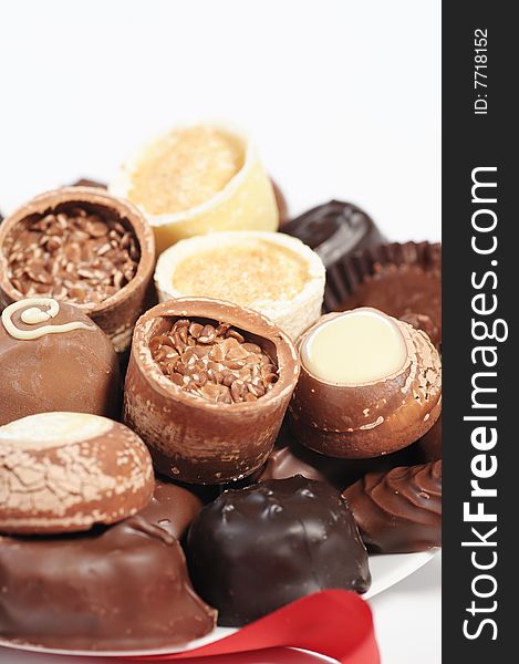 Assorted chocolates isolated on white