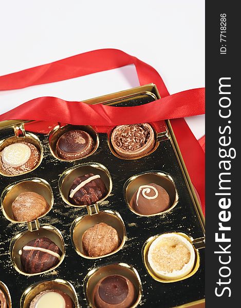 Assorted chocolates isolated on white