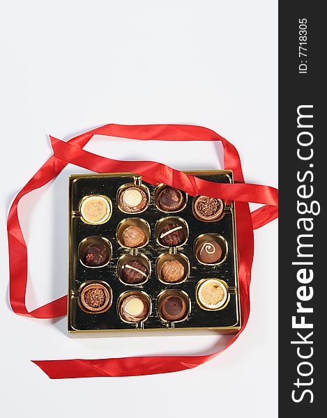 Assorted chocolates isolated on white