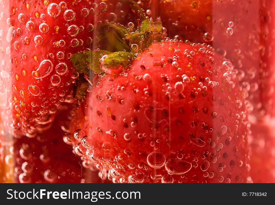 Close up picture of strawberries in glass