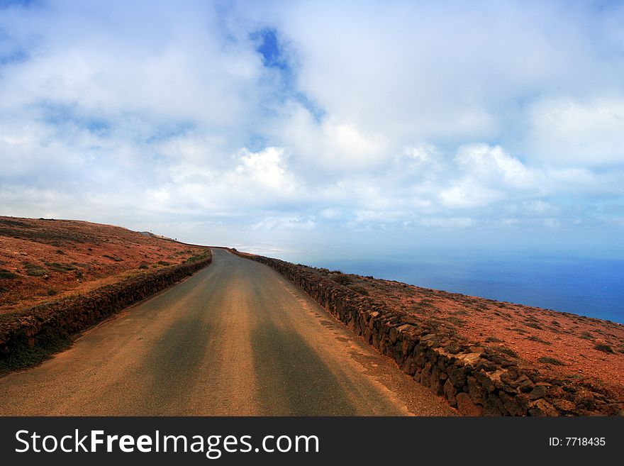 Road under blue skies, Canary Island Lanzarote. Road under blue skies, Canary Island Lanzarote