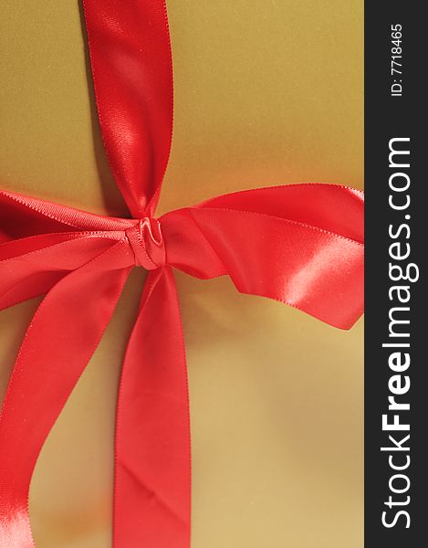 Gift box with red ribbon isolated on white