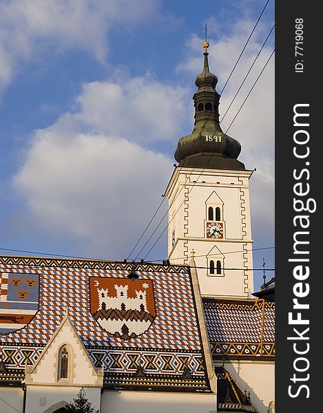 The St. MarkÂ´s Church in Zagreb with colorful tiled rooftop. The St. MarkÂ´s Church in Zagreb with colorful tiled rooftop.
