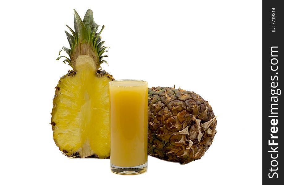 Glass juice and pineapples isolated on the white. Glass juice and pineapples isolated on the white