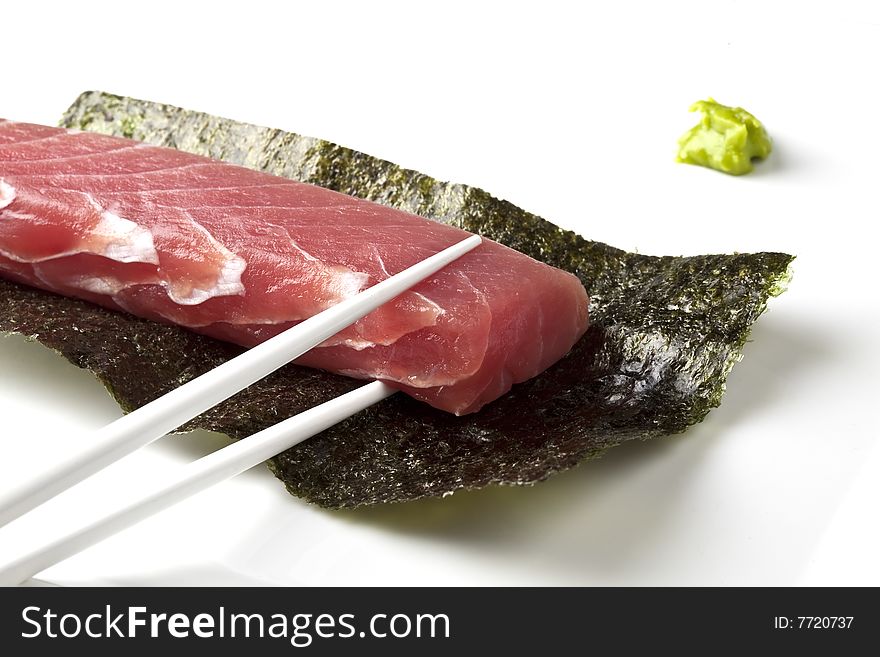 Red Tuna Sashimi and Chopsticks close-up