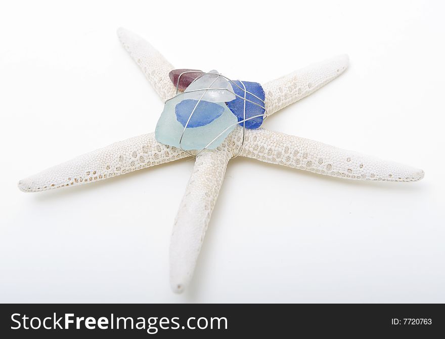 Starfish with sea glass and silver wire. Starfish with sea glass and silver wire