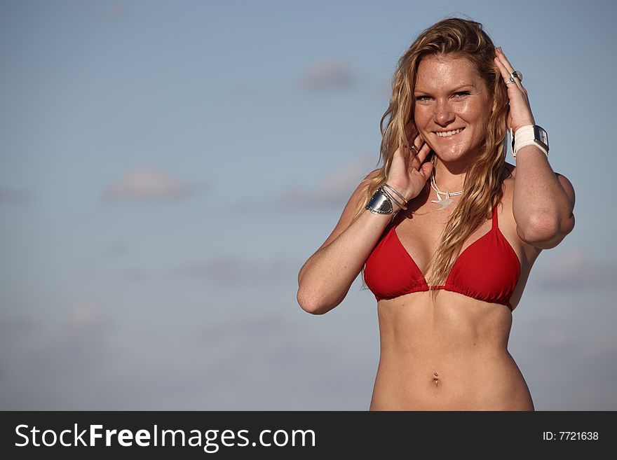 Woman Posing On A Sky Background