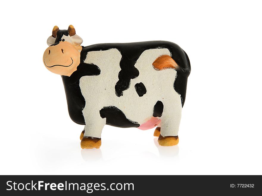 Crazy toy cow on white background