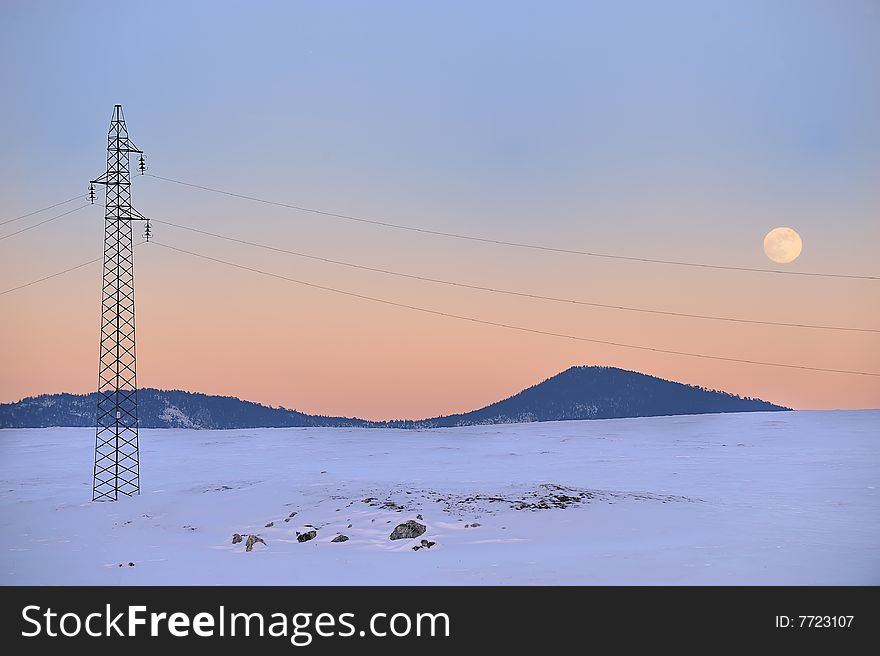 Electric long distance line on the snow. Electric long distance line on the snow