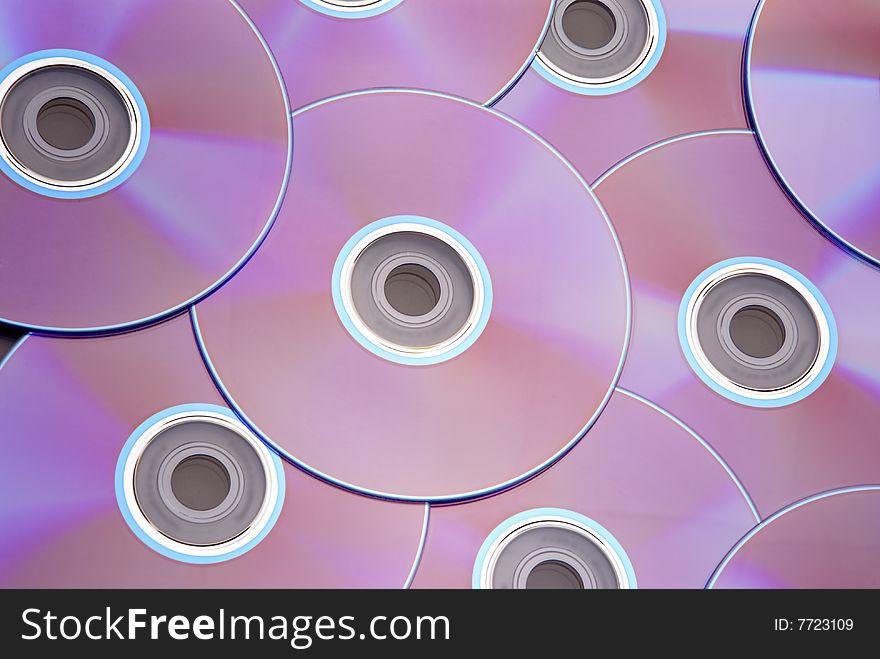 Pile of colorful DVD discs