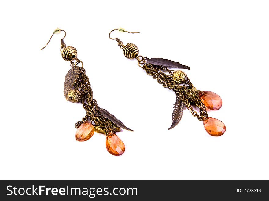 Ear-rings close-up isolated on a white background