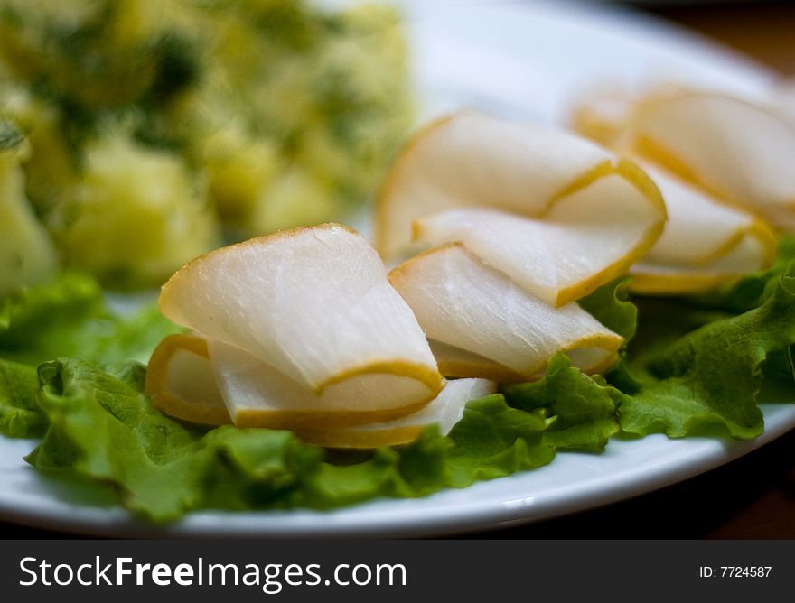 Balyk and potato mash with salad and dill