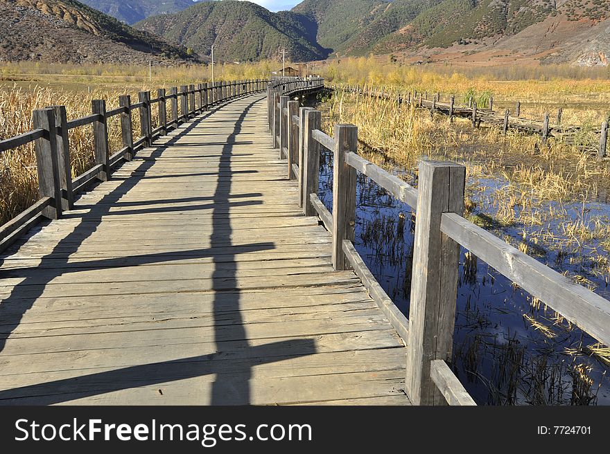 The wooden bridge of  meandering bend