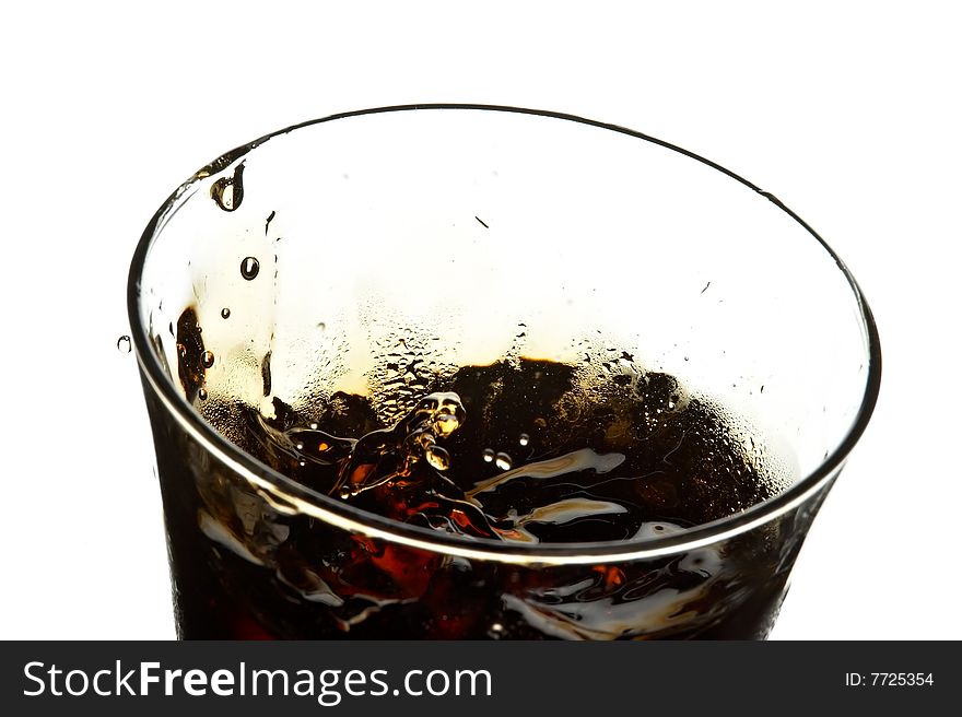 Glass with cola and ice on the white background