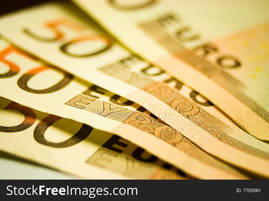 Macro and selective focus of 50 euros banknotes. Macro and selective focus of 50 euros banknotes.