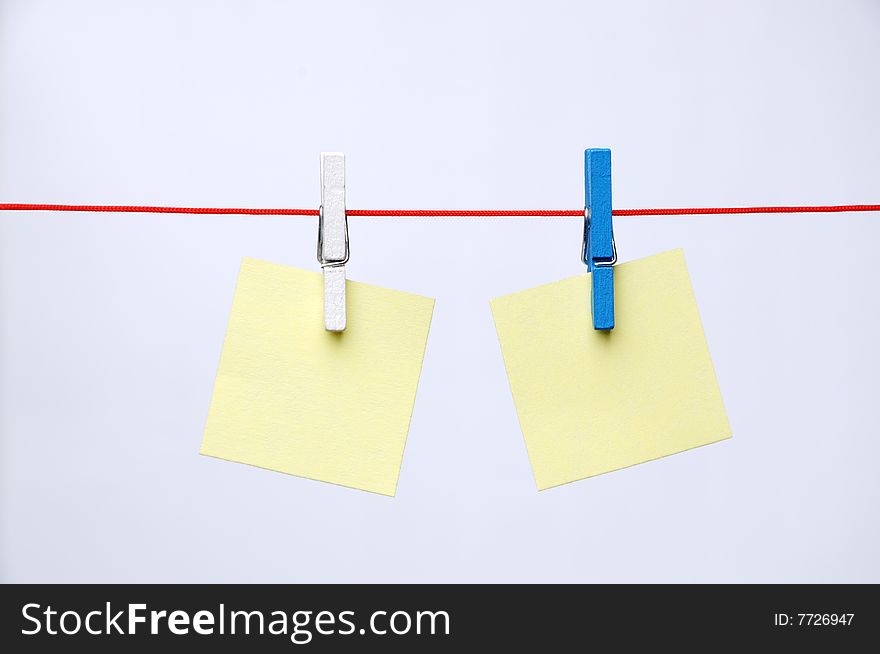 Paper Blanks Hanging on a Rope Held By Clothespins