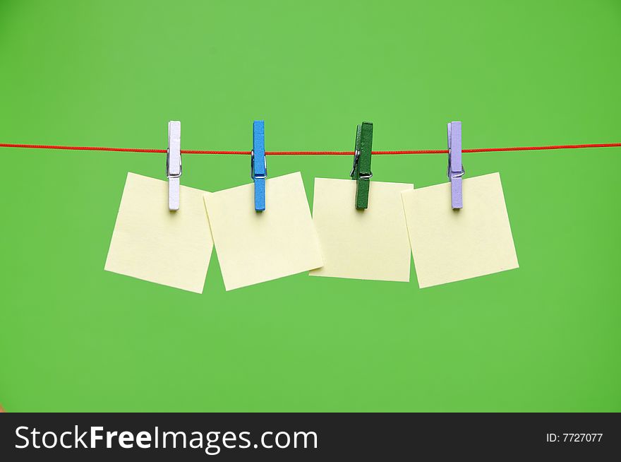 Paper Blanks Hanging on a Rope Held By Clothespins