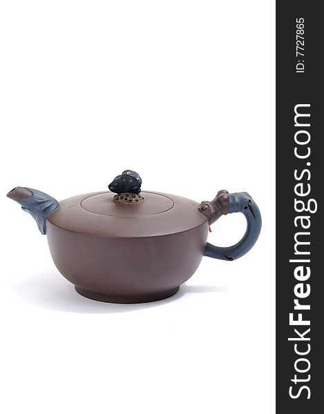 Isolated clay teapot on white background