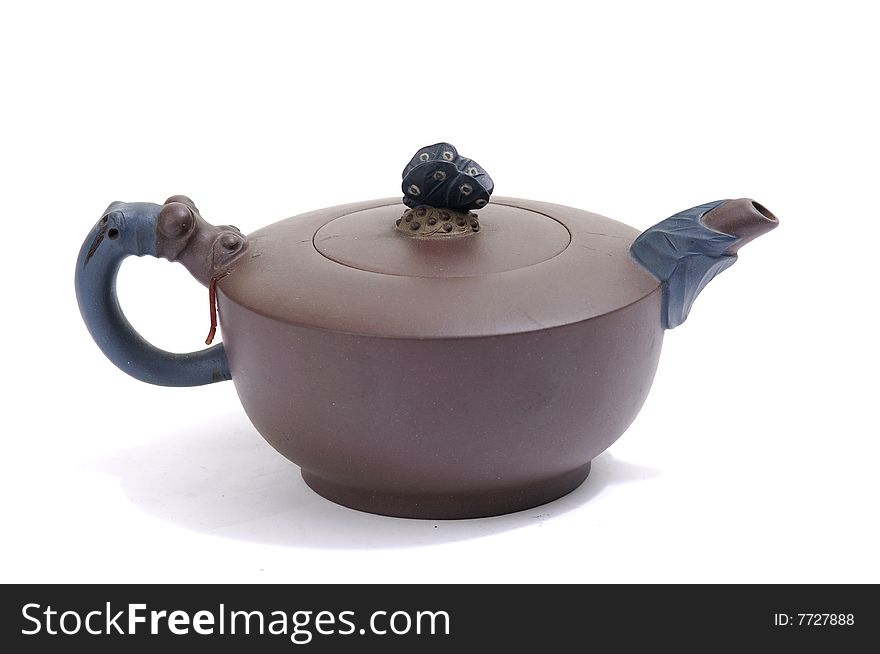 Isolated clay teapot on white background