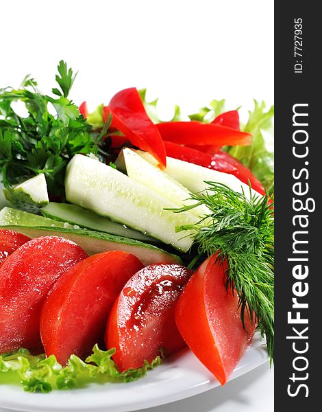 Fresh Vegetables Plate with Parsley, Salad Leaves and Dill. Isolated on White Background