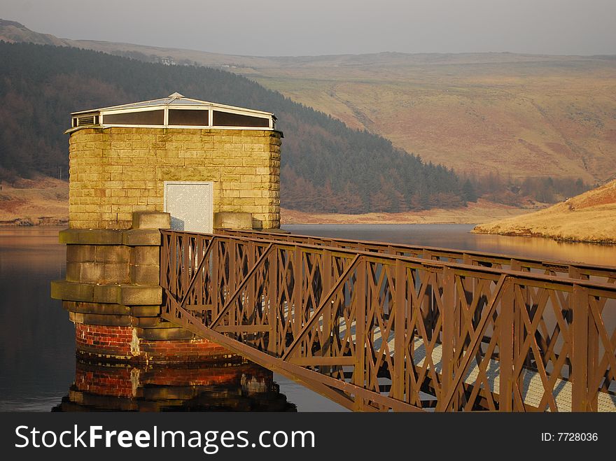 Bridge Leading to the hut at a reservoir. Bridge Leading to the hut at a reservoir