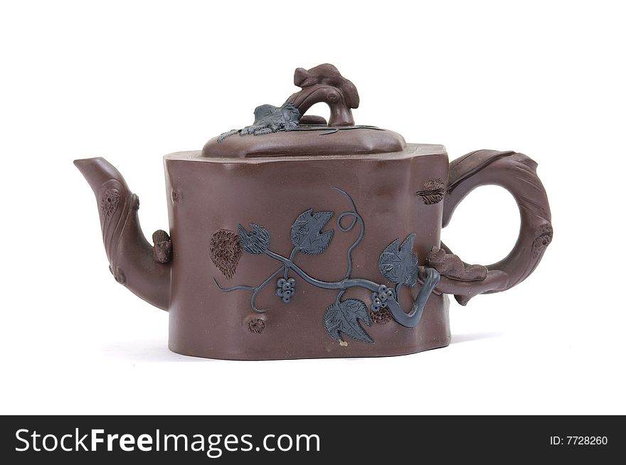 Isolated clay teapot on white background