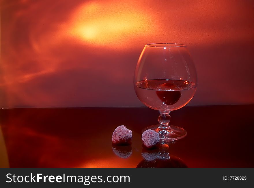 Glass of white wine  and frozen berries. Glass of white wine  and frozen berries