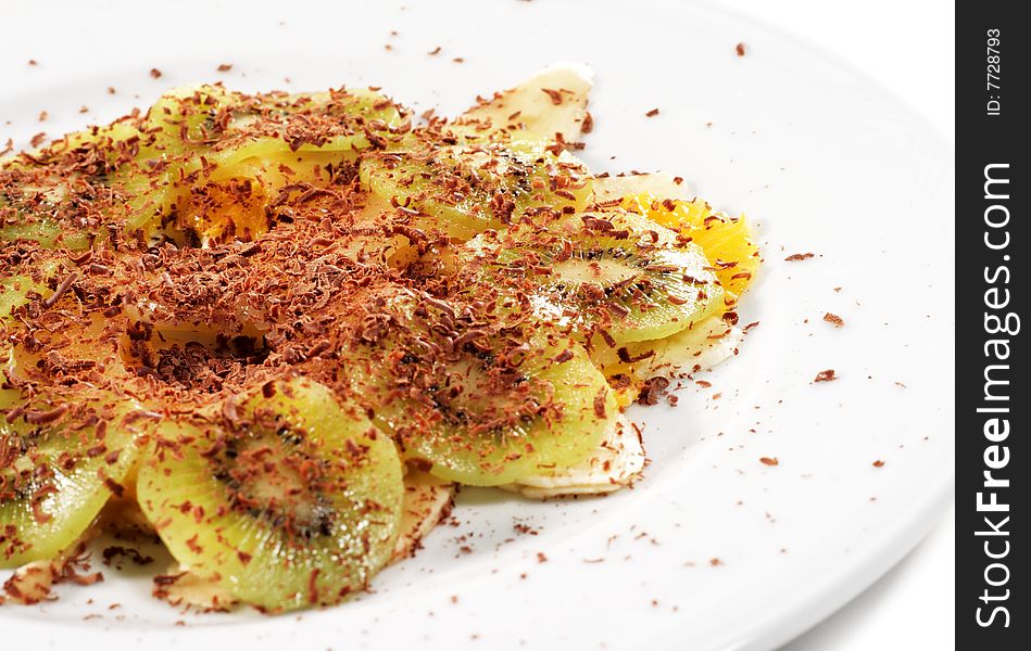 Fruit Carpaccio Plate under Chocolate Crumb. Isolated on White Background