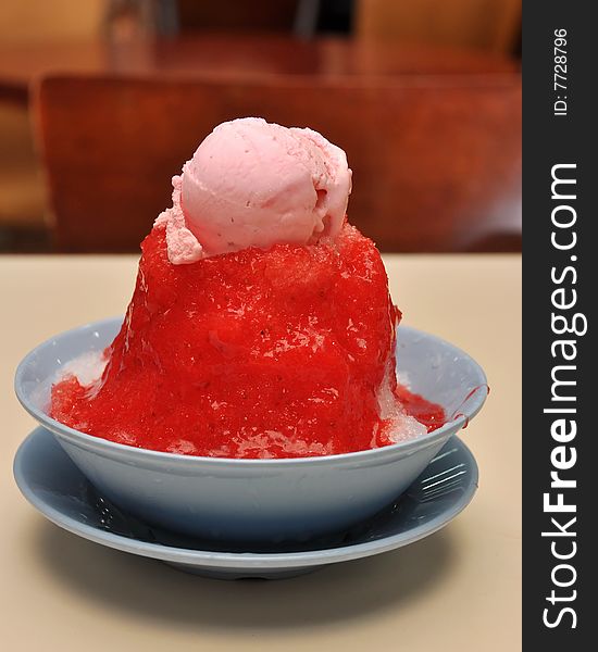 Ice cream dessert with strawberry and syrup. Ice cream dessert with strawberry and syrup