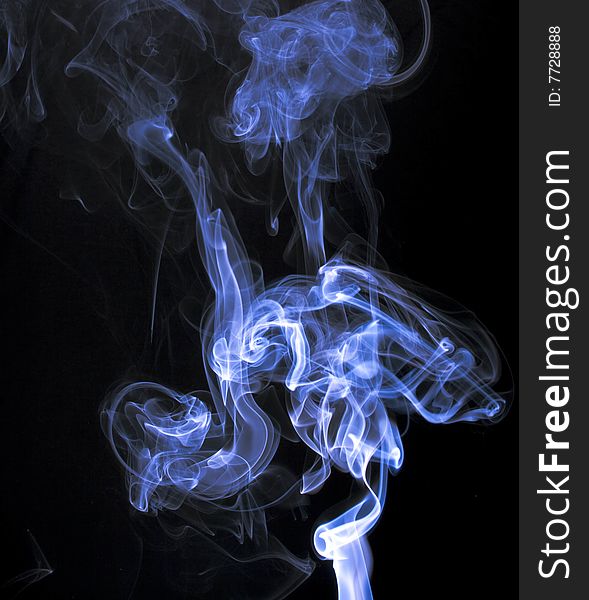 Colorful and electronic smoke on a isolated black background. Colorful and electronic smoke on a isolated black background.