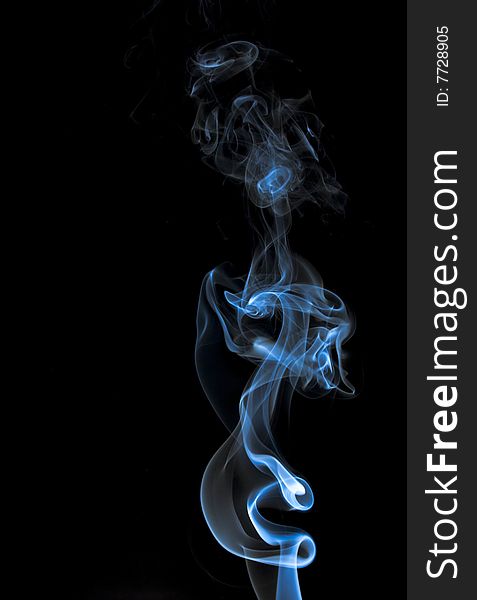 Colorful and electronic smoke on a isolated black background. Colorful and electronic smoke on a isolated black background.