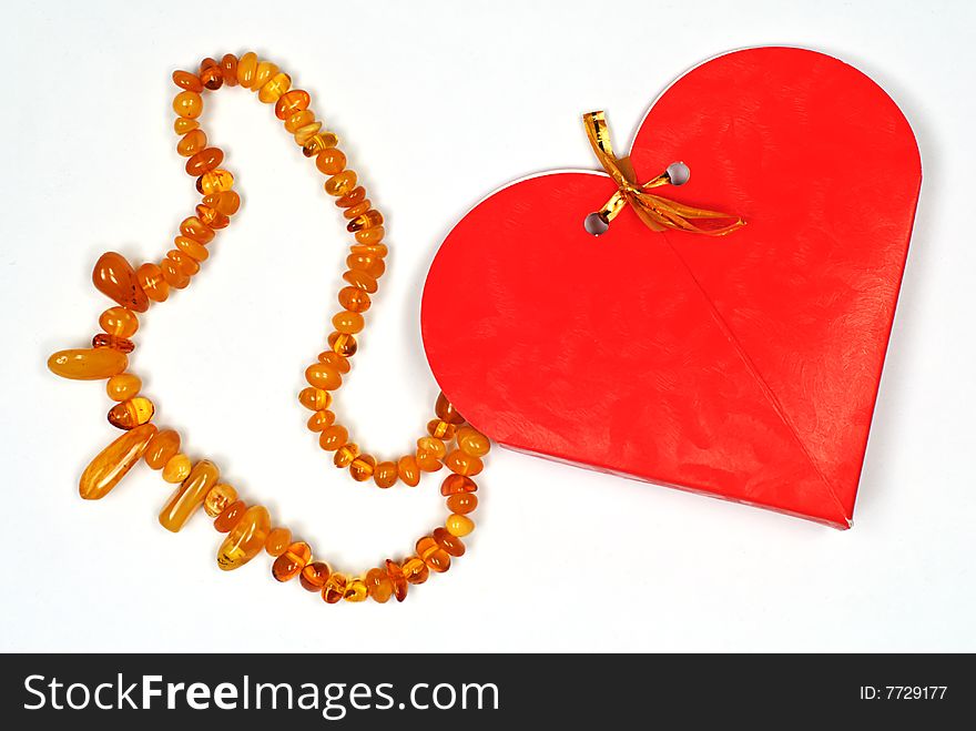 Valentine day gift amber necklace on white. Valentine day gift amber necklace on white
