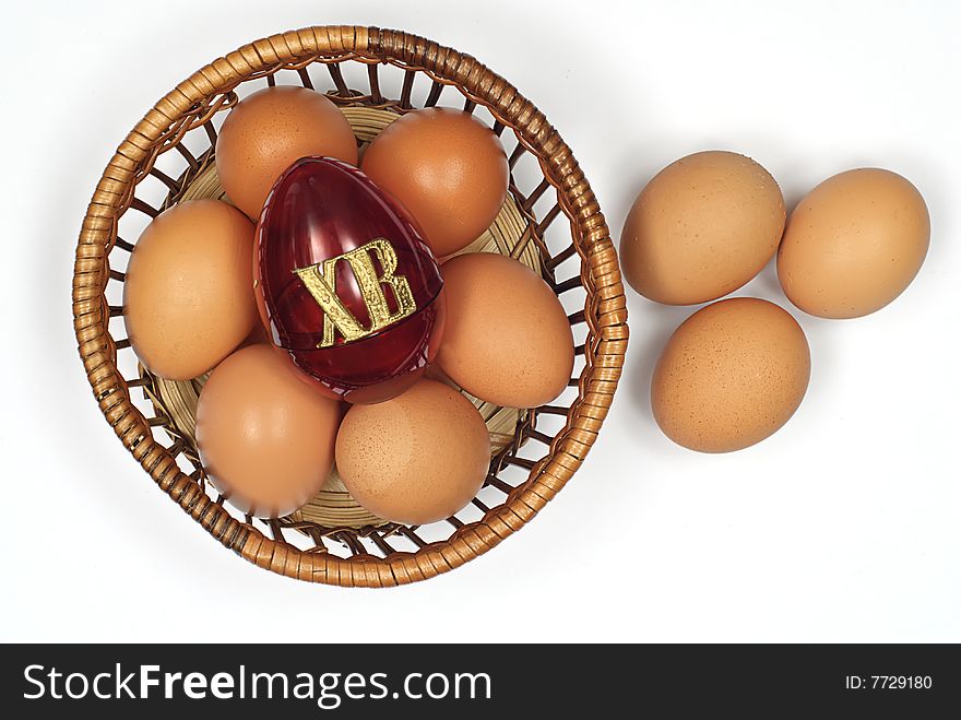 Easter egg in basket isolated