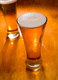 Two Beer Glasses, Focus On First Royalty Free Stock Photo